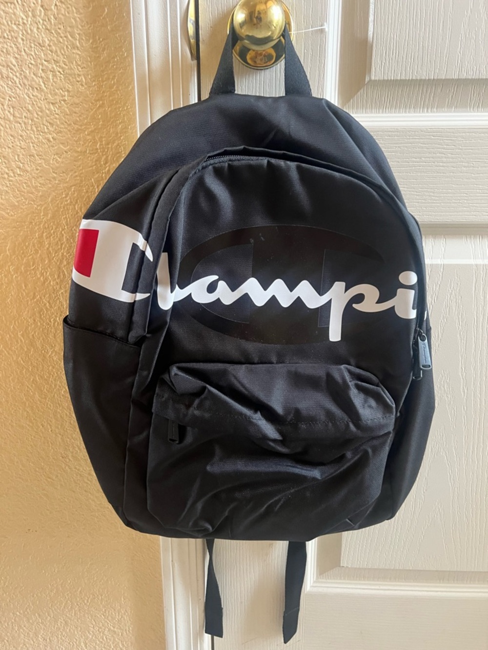 Champion Black Kids Backpack with White Script and Red Patch